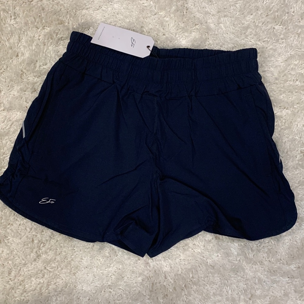 Women’s Everforward Athletic shorts in navy. Size medium. BNWT